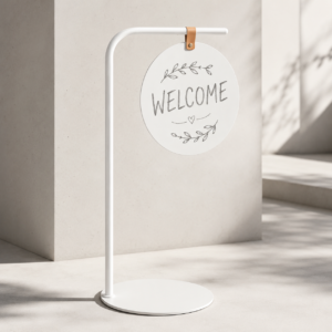 White curved-tube chalkboard-style message stand with round board